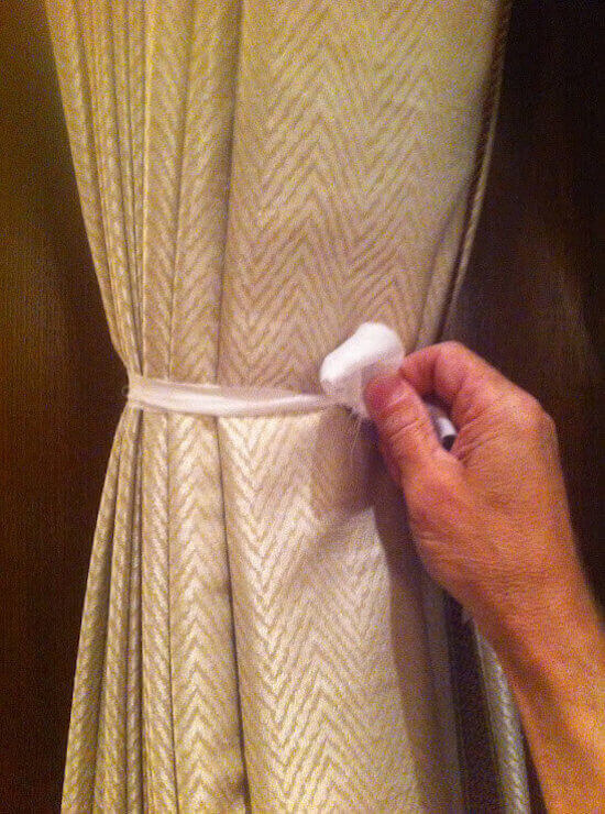 Hotel curtains being untied